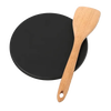 Handcrafted heat diffuser plate with smooth black surface paired with a wooden spatula, ideal for creating even cooking heat, perfect for Kitchen & Food, Kitchen Gadgets, and USA Made collections.