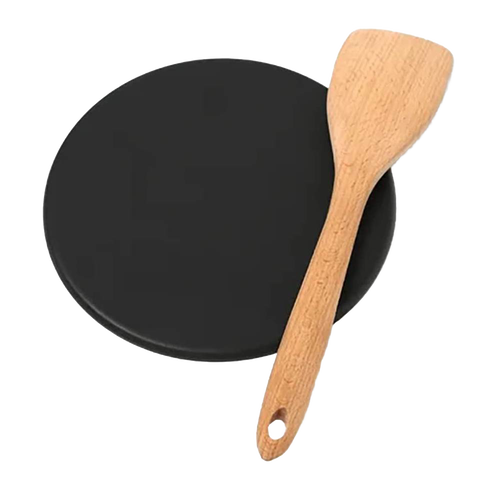 Handcrafted heat diffuser plate with smooth black surface paired with a wooden spatula, ideal for creating even cooking heat, perfect for Kitchen & Food, Kitchen Gadgets, and USA Made collections.