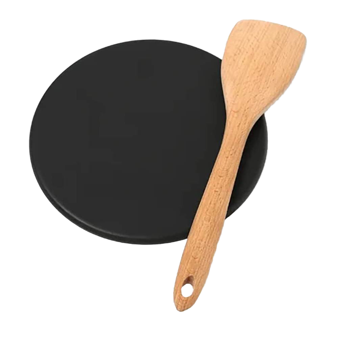 Handcrafted heat diffuser plate with smooth black surface paired with a wooden spatula, ideal for creating even cooking heat, perfect for Kitchen & Food, Kitchen Gadgets, and USA Made collections.