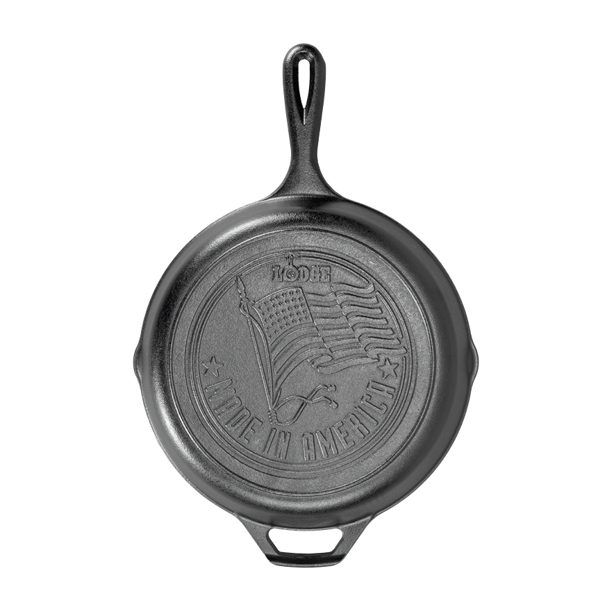 Top view of handcrafted cast iron skillet with embossed American flag and "Made in America" lettering, featured in Kitchen & Food, Cookware, Cast Iron, USA Made, and Best Sellers collections.