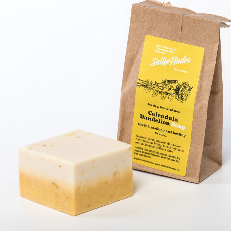 Handcrafted hypoallergenic Calendula Dandelion soap bar with natural golden tones, made in USA, ideal for Health & Wellness, Grooming and Personal Hygiene, and Soaps collections.