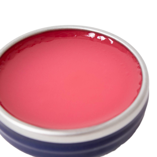 Open metal tin of handcrafted rose-colored salve with a smooth surface, made in USA, suitable for Health & Wellness, Health Remedies, and Best Sellers collections.