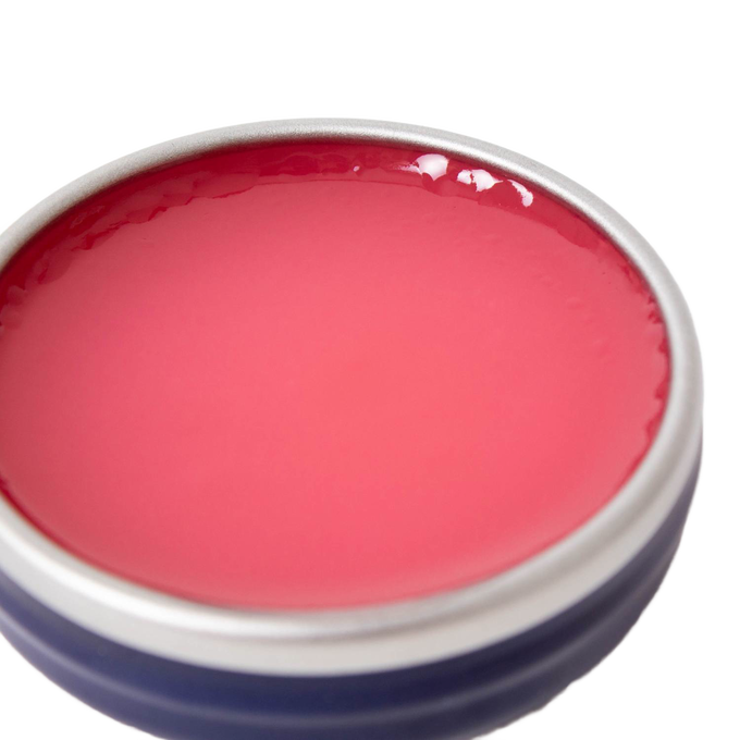 Open metal tin of handcrafted rose-colored salve with a smooth surface, made in USA, suitable for Health & Wellness, Health Remedies, and Best Sellers collections.