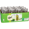 Pack of twelve wide-mouth clear glass quart jars with metal lids and bands, handcrafted in the USA for food preservation, canning, crafts, and kitchen use.
