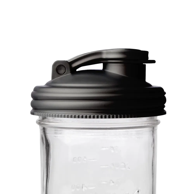 Black flip-top pour lid with carry loop designed for wide-mouth mason jars, made from durable no-break plastic, ideal for Kitchen & Food, Kitchen Gadgets, USA Made, and Best Sellers collections.