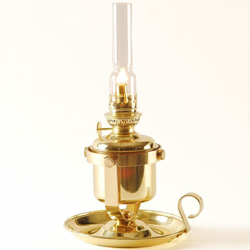 Handcrafted brass oil lamp with gimbaled design to stay upright on any surface, featuring clear glass chimney, ideal for lamps & lighting, oil lamps, and best sellers collections.