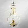 Polished brass hanging oil lamp with a clear glass chimney and solid brass frame, designed to spread warm light, suitable for farm, garden, emergency, and hanging lamp collections.
