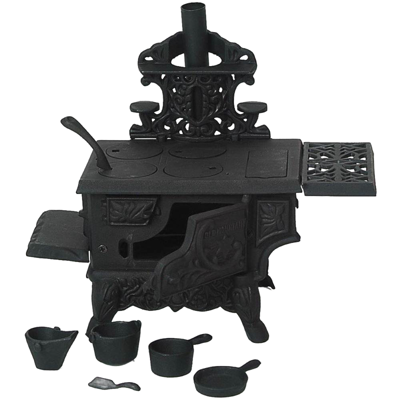 Miniature cast iron wood cook stove with working oven doors, removable lids, two pots, skillet, coal hod and scoop, designed for children's indoor play and best sellers collections.