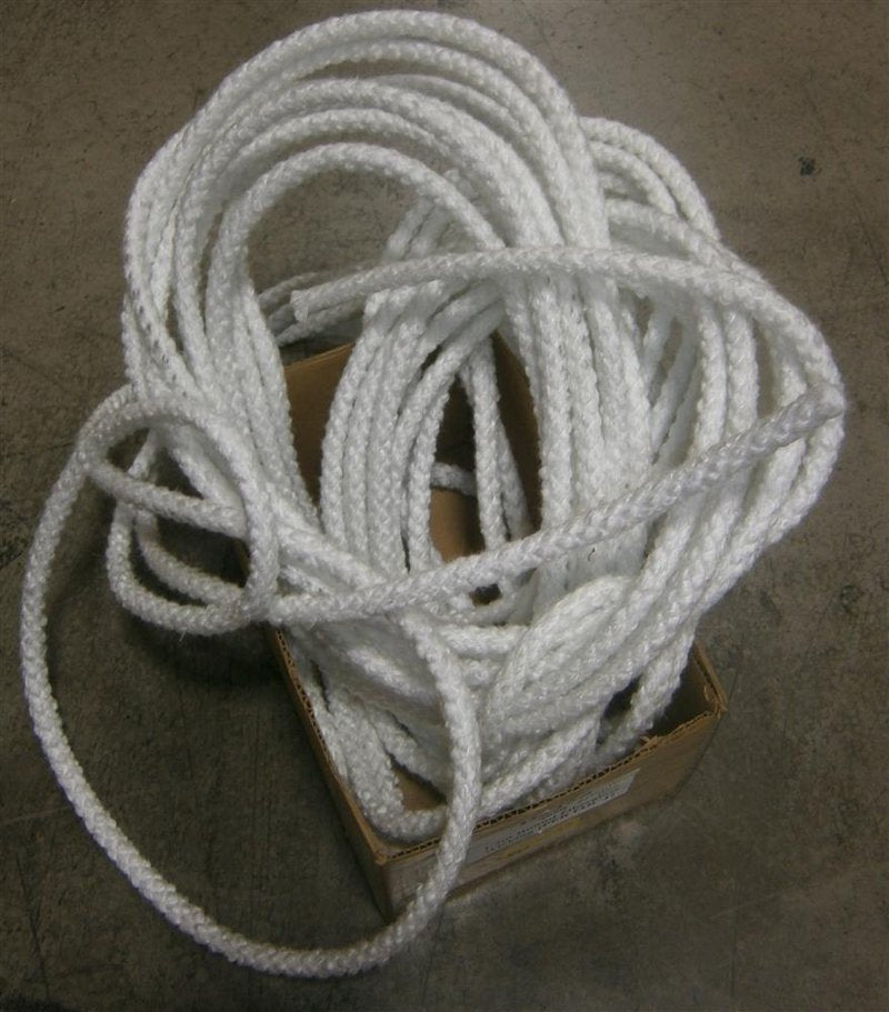 Bundle of white braided fiberglass wick material coiled loosely inside a small open cardboard box, suitable for use in lamps and lighting accessories from best sellers collections.