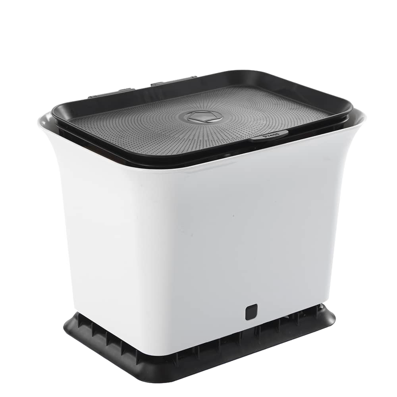 White sturdy compost bin with a black vented lid and base, designed for odor-free kitchen use and handcrafted for farm, garden, and kitchen collections.