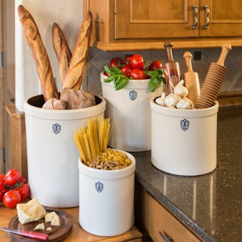 Set of handcrafted 5-gallon and smaller numbered stoneware crocks made in USA, used for kitchen storage and food preservation, featured in Kitchen & Food and Food Preservation collections.