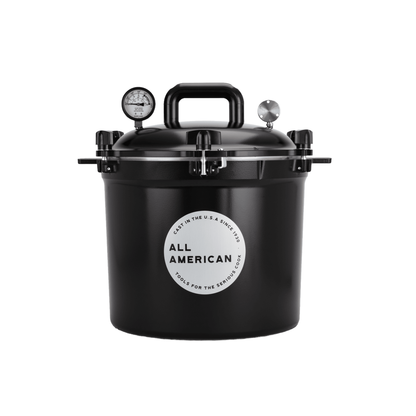 Black pressure canner with secure locking lid, built-in pressure gauge, and heavy-duty handle, designed for safe and reliable food preservation in USA Made kitchen and canning collections.