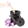 Handcrafted fermenting crock kit with a wooden stomper and weights, shown with sliced purple cabbage, ideal for Kitchen & Food, Food Preservation, and Fermenting and Pickling collections.
