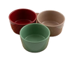 Set of three ceramic condiment bowls in red, beige, and green with subtle textured patterns, ideal for holiday entertaining and part of Kitchen & Food, Storage and Serving collections.