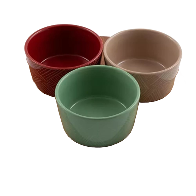 Set of three ceramic condiment bowls in red, beige, and green with subtle textured patterns, ideal for holiday entertaining and part of Kitchen & Food, Storage and Serving collections.