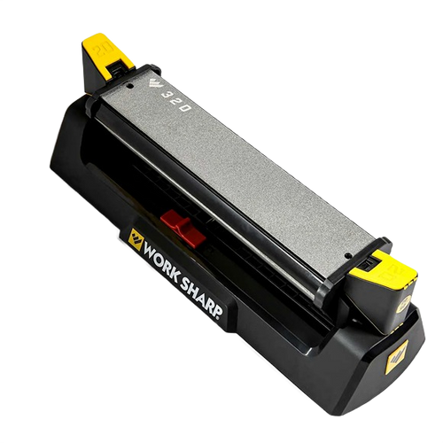 Compact benchstone sharpener with three-sided abrasive surfaces, featuring angle guides and a black base with yellow adjustment knobs, ideal for sharpening knives and scissors in food prep and hand tool collections.
