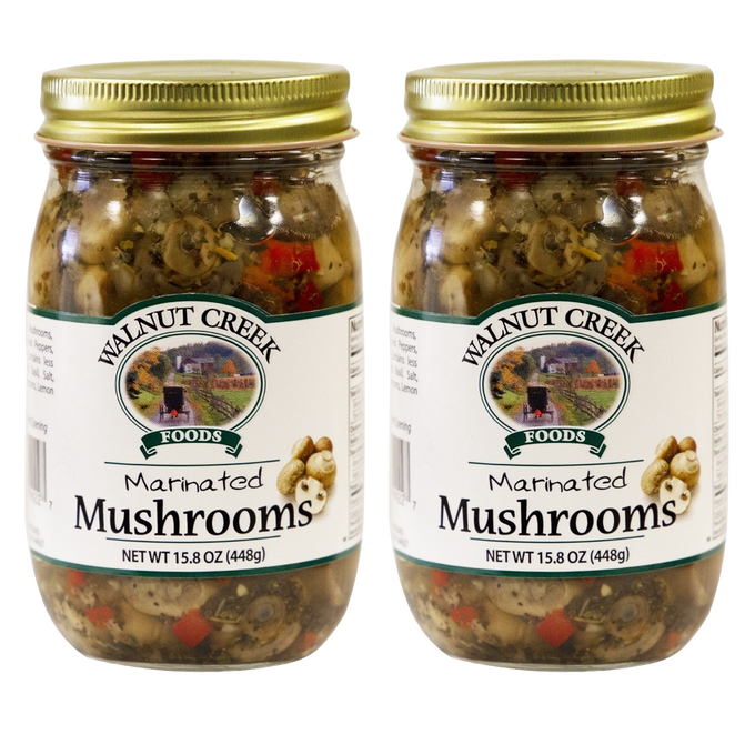 Two glass jars of handcrafted marinated mushrooms with red peppers and onions, prepared in USA, ideal for Kitchen & Food, Pantry, and Best Sellers collections.