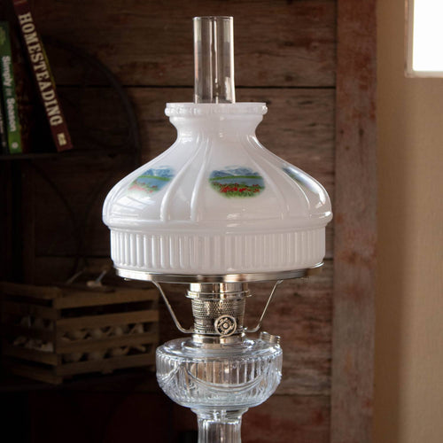 Handcrafted 10-inch white glass lamp shade with painted Alpine Meadow scenes, designed to soften light from oil lamps, featured in Lamps & Lighting and Parts and Accessories collections.
