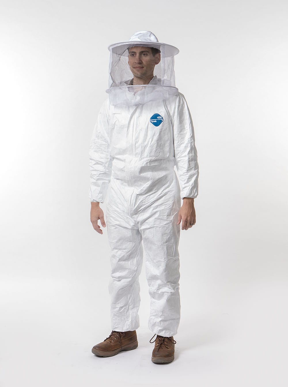 Person modeling white beekeeping coveralls with elastic cuffs and ankles, featuring a full-front zipper and a protective veil hat accessory, ideal for Farm, Garden & Tool and Beekeeping Supplies collections.