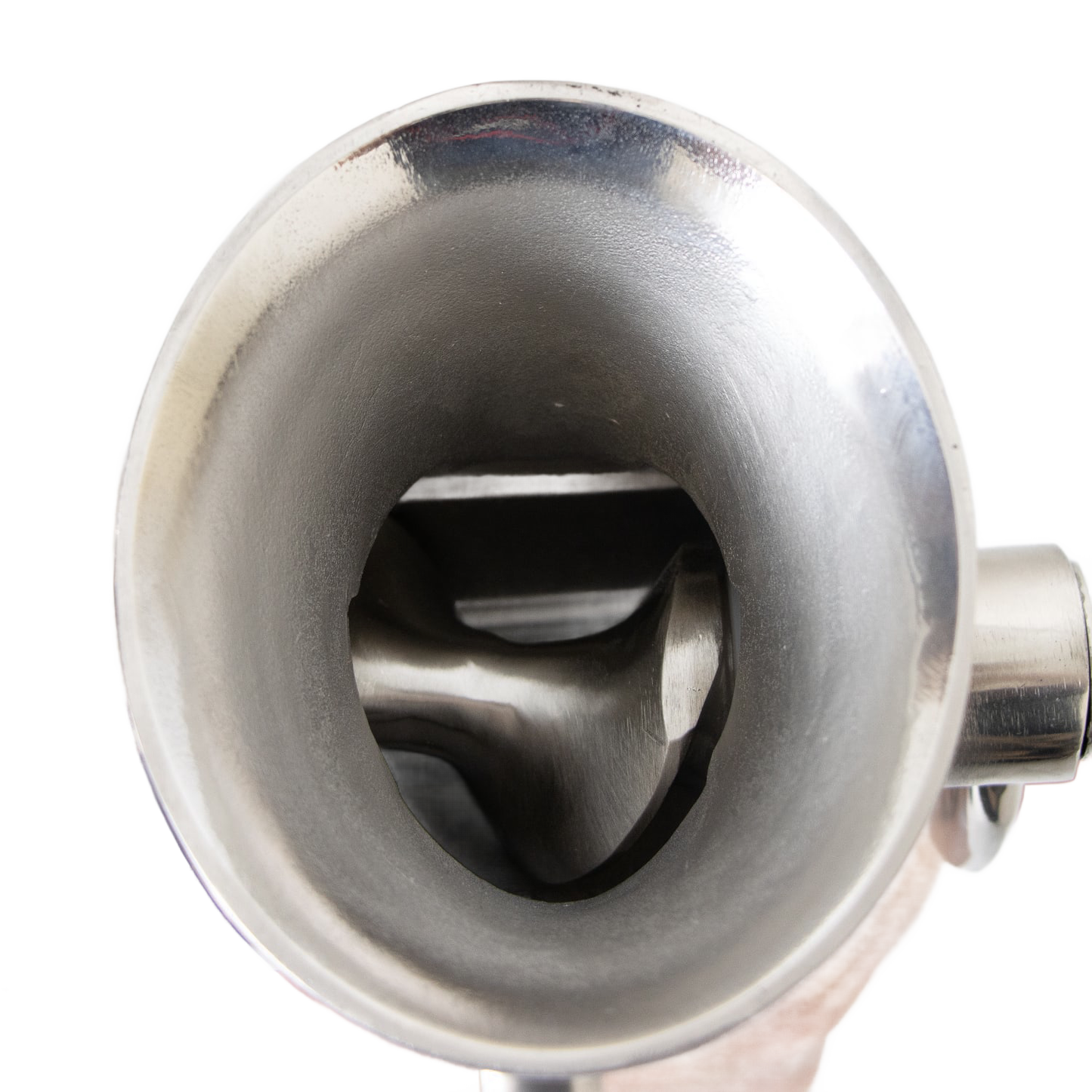Top-down view into a stainless steel food grinder with a visible auger inside, designed for Kitchen & Food, Specialty Equipment, Butchering Supplies, and Best Sellers collections.