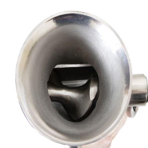 Top-down view into a stainless steel food grinder with a visible auger inside, designed for Kitchen & Food, Specialty Equipment, Butchering Supplies, and Best Sellers collections.