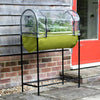 Green fabric raised bed garden planter elevated on a black metal frame with clear polyethylene greenhouse cover, ideal for small patios or balconies in Farm, Garden & Tool and Garden Accessories collections.