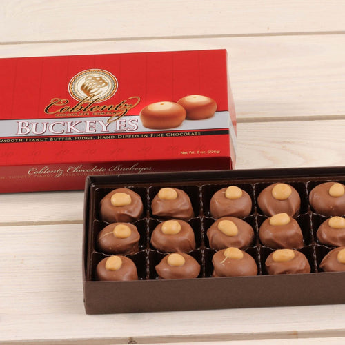 Boxed set of handcrafted chocolate buckeyes featuring smooth peanut butter fudge centers hand-dipped in milk chocolate, part of Kitchen & Food, Snacks and Sweets, Candy, and USA Made collections.
