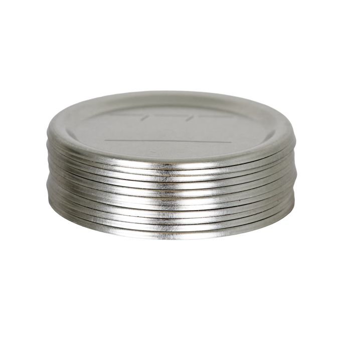 Stack of silver-colored metal canning lids sized for regular-mouth jars, featuring BPA-free sealing compound, ideal for food preservation and kitchen use.