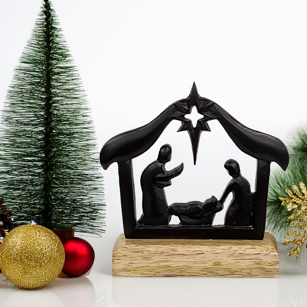 Handcrafted cast iron nativity scene on a wooden base featuring the Holy Family and North Star silhouette, perfect for Home & Decor, Holiday Decor, Best Sellers, and Promo Eligible collections.