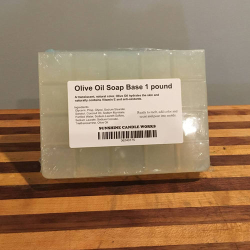 Handcrafted translucent olive oil soap base bar weighing one pound, naturally enriched with Vitamin E and antioxidants, perfect for health and wellness soapmaking supplies.