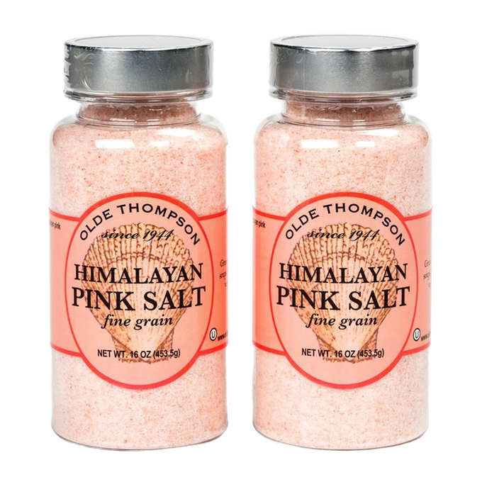 Two bottles of fine-grain handcrafted Himalayan pink salt with metal lids, ideal for Kitchen & Food, Pantry, Food Preservation, and Fermenting collections.