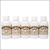 Row of five handcrafted Ogallala Bay Rum cologne and aftershave bottles featuring original, lime and pepper, sage and cedar, and sandalwood scents, made in USA for grooming and personal hygiene collections.