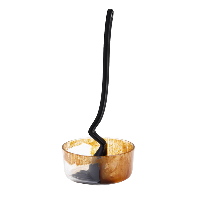 Black basting brush with a deep flexible scooping head resting in a sauce-coated clear bowl, designed for effortless sauce application in Kitchen Gadgets, Grilling, and Cooking helpers collections.