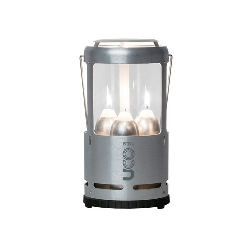 Handcrafted Candlelier Candle Lantern with three lit candles inside a sturdy metal frame, designed for reliable outdoor lighting in camping, emergency, and garden settings.