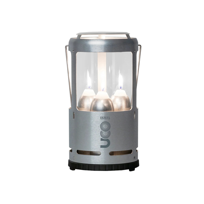 Handcrafted Candlelier Candle Lantern with three lit candles inside a sturdy metal frame, designed for reliable outdoor lighting in camping, emergency, and garden settings.