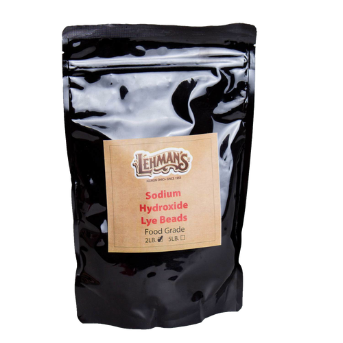 Resealable black pouch of food-grade sodium hydroxide lye beads in 2-lb size, featured in Health & Wellness, Soaps and Soapmaking, Soapmaking Supplies, USA Made, and Best Sellers collections.