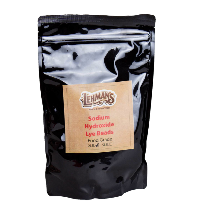 Resealable black pouch of food-grade sodium hydroxide lye beads in 2-lb size, featured in Health & Wellness, Soaps and Soapmaking, Soapmaking Supplies, USA Made, and Best Sellers collections.