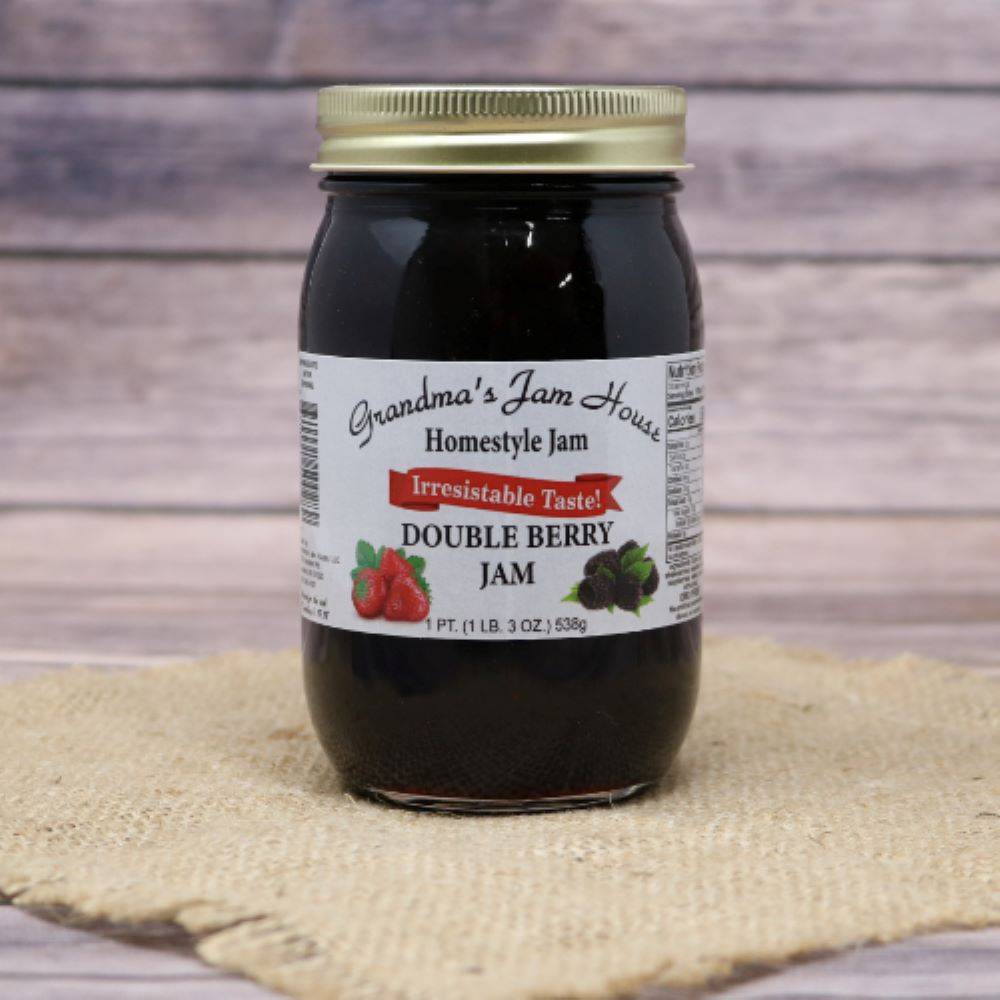 Glass jar of handcrafted double berry jam with gold lid and white label featuring raspberry and blackberry illustrations, included in Kitchen & Food, Pantry, Peanut Butter & Jellies, USA Made, Best Sellers, and Promo Eligible collections.