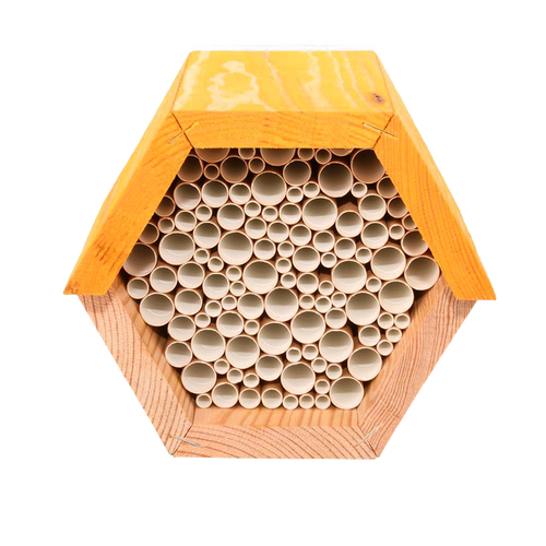 Hexagonal pine wood bee house with paper straw tubes inside, designed to provide shelter for beneficial bees, ideal for farm, garden, and garden accessories collections.