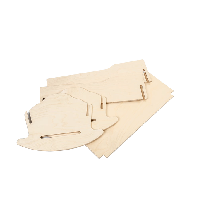 Unassembled natural wood pieces for a handcrafted Amish made collapsible doll cradle, designed for easy storage and perfect for indoor play in wooden toys and children's collections.
