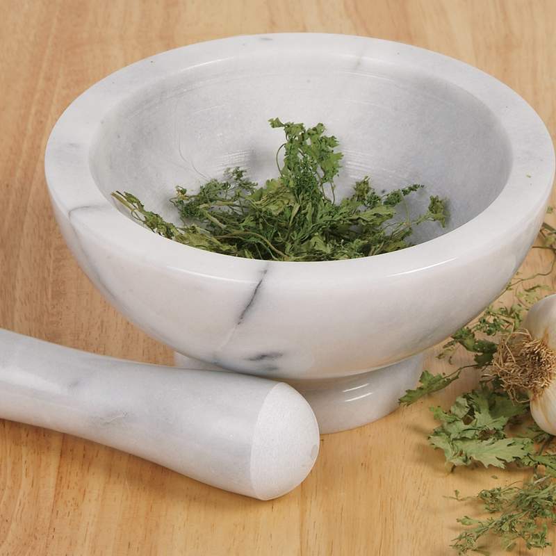Solid marble mortar and pestle with fresh herbs, handcrafted for durable use without flavor transfer, ideal for Kitchen & Food, Food Prep, Choppers and Cutters, Best Sellers, Promo Eligible collections.