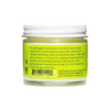Small glass jar of handcrafted face cream with jojoba esters, turmeric, sandalwood, palmarosa, and cypress extracts, made in USA for health and wellness care.