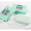 Three bars of pale green Kirk's Aloe Vera Castile soap with packaging and one unwrapped bar resting on folded white towels, ideal for Health & Wellness and Grooming collections, made in USA.