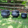 Set of three handcrafted cast iron campfire kettles with lids and sturdy handles, ideal for outdoor cooking in Farm, Garden & Tool, Camping, Best Sellers, and Promo Eligible collections.