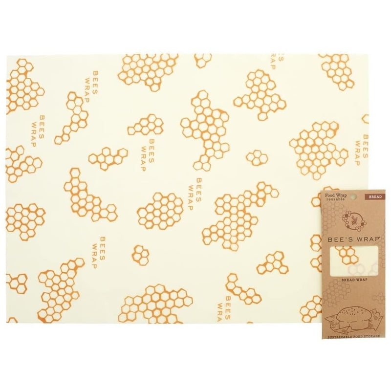 Handcrafted muslin cloth bread wrap with beeswax coating featuring honeycomb patterns, reusable and made in the USA, suitable for Kitchen & Food and Storage and Serving collections.