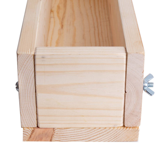 Handcrafted pine soap loaf mold with adjustable end piece secured by metal wing nuts, designed for cold process soapmaking in Health & Wellness and Soapmaking Supplies collections.