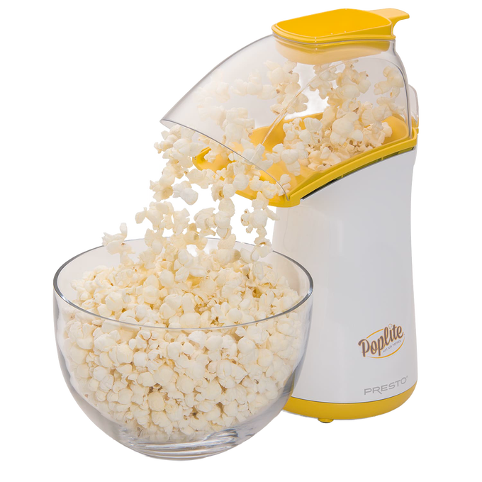 Compact electric air popcorn popper with yellow and white housing, pouring freshly popped popcorn into a clear glass bowl, featured in Kitchen & Food, Popcorn, and Kitchen Gadgets collections.