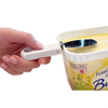 Handheld foldable white butter knife with collapsible handle snapped onto a rectangular butter tub, designed for convenient spreading in Kitchen & Food, Kitchen Gadgets, and Best Sellers collections.