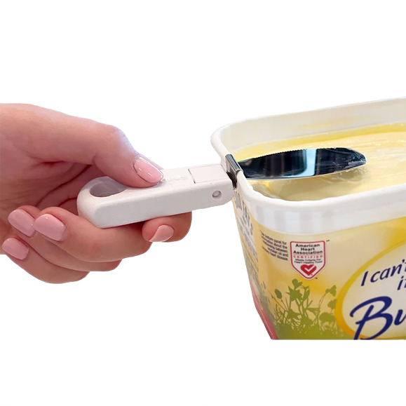Handheld foldable white butter knife with collapsible handle snapped onto a rectangular butter tub, designed for convenient spreading in Kitchen & Food, Kitchen Gadgets, and Best Sellers collections.