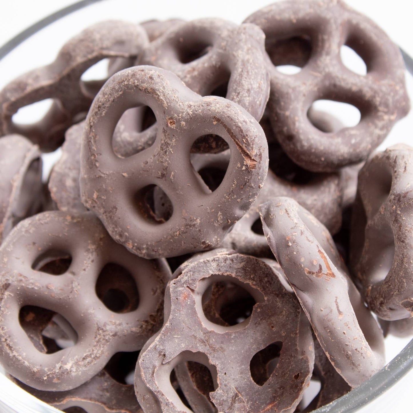 Close-up of handcrafted Amish-made mini pretzels coated in rich dark chocolate, a delicious USA made snack from Kitchen & Food, Snacks and Sweets, Candy, Best Sellers, and Promo Eligible collections.